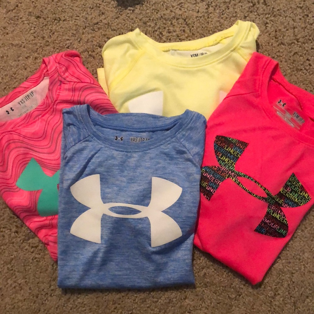Lot of UnderArmour shirts 2 are YXS and 2 are YSM